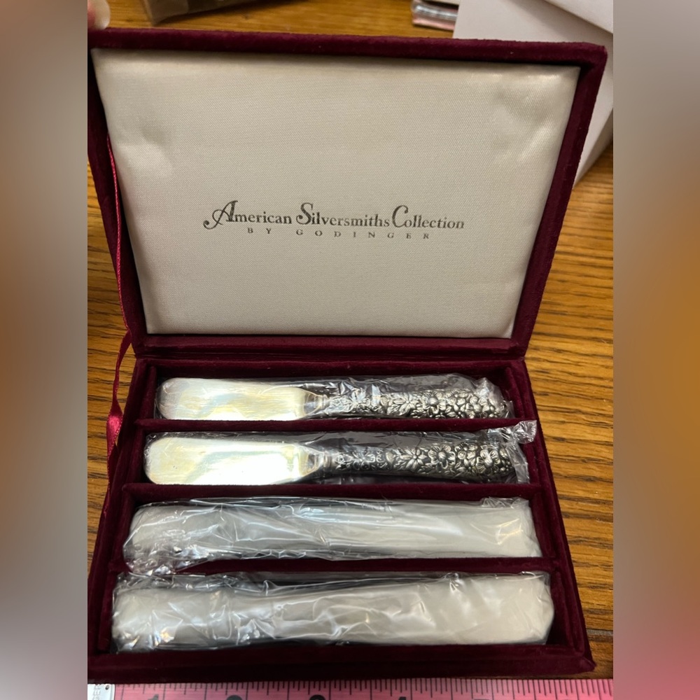 Vintage silvered butter knife set